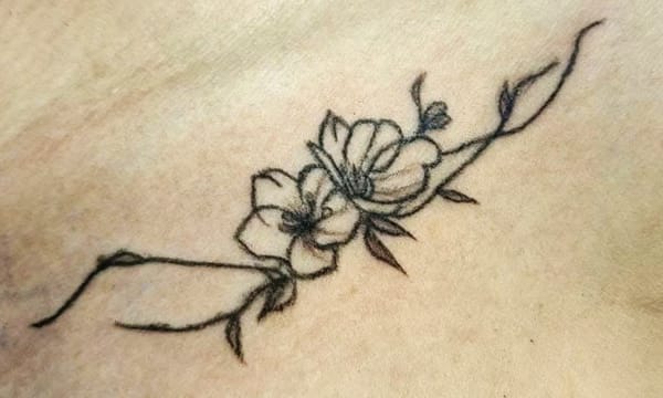 Floral Collarbone Fine Line and Illustrative Sketch Style Tattoo